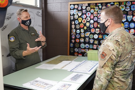 Chief Master Sgt. Michael Morgan listens to a briefing at the DLIELC Aviation Language Training Center at JBSA-Lackland, Texas.