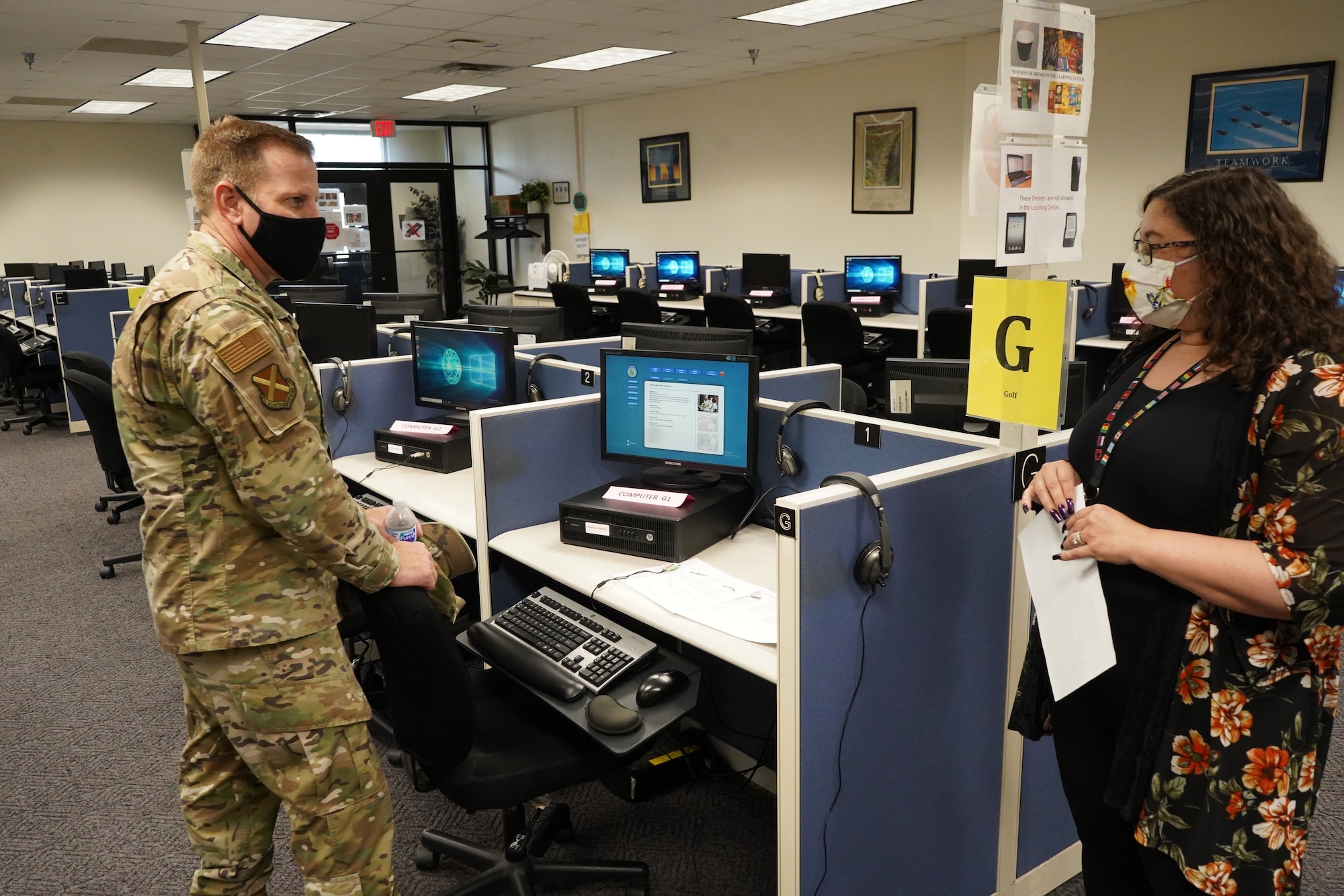 Chief Master Sgt. Michael Morgan learns about the DLIELC learning center.