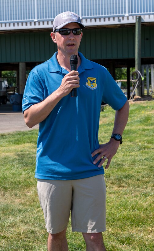 Col. Shanon Anderson, 436th Airlift Wing commander, gives remarks during the Bluesuiters Golf Tournament at Jonathan’s Landing Golf Course, Magnolia, Delaware, May 19, 2021. Twice a year, the tournament sponsors Airmen, matching them with local Chamber of Commerce members. This year, 33 Airmen participated for an opportunity to engage in team building activities and network. (U.S. Air Force photo by Airman 1st Class Cydney Lee)