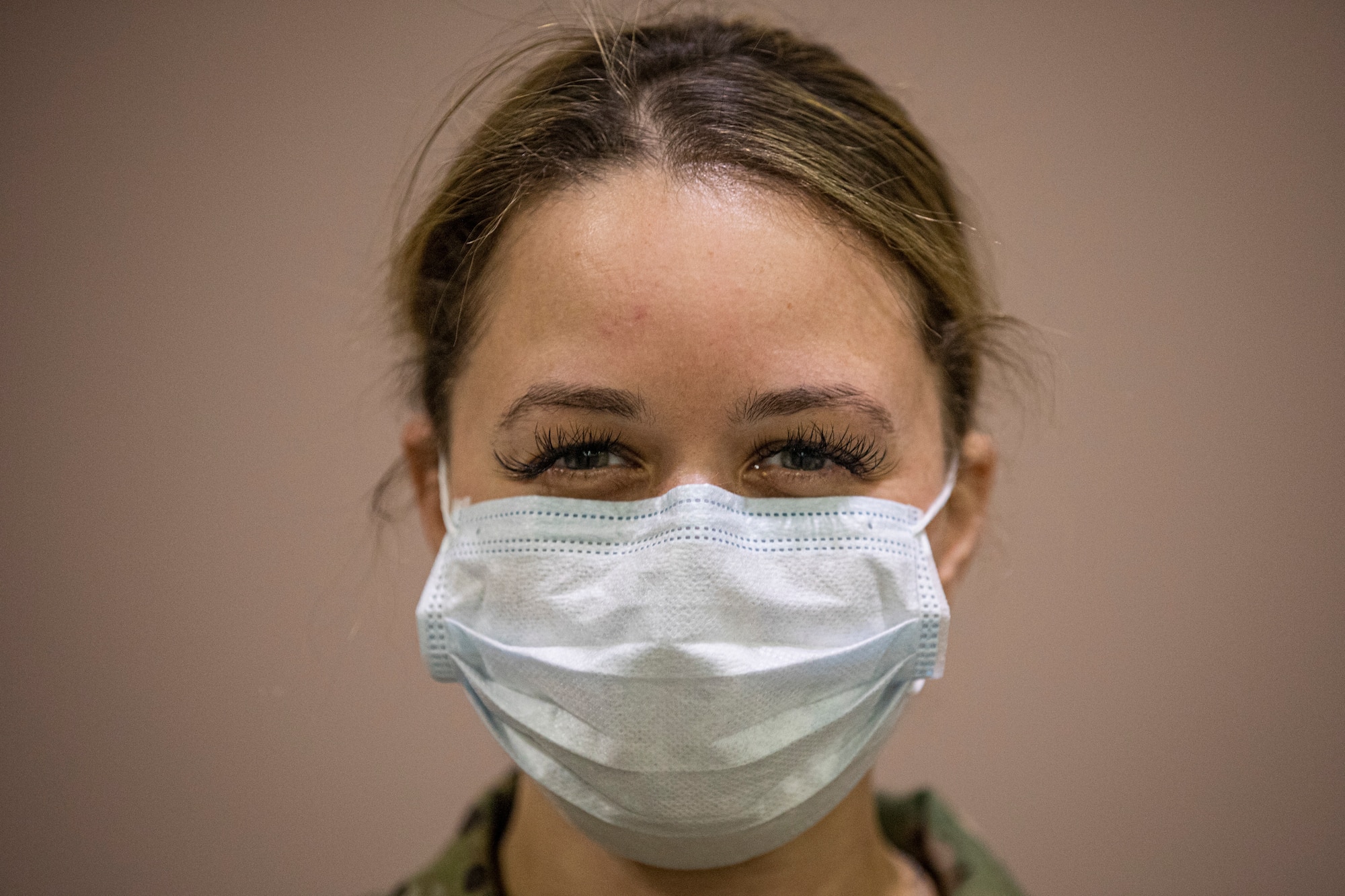 New Jersey Air National Guard Staff Sgt. Samantha Massey stands for a portrait during the buildup of a Field Medical Station at the Atlantic City Convention Center in Atlantic City, N.J., April 9, 2020.  Atlantic City is one of three stations that will offer overflow from local hospitals focused on COVID-19 patients. Massey is with the 177th Fighter Wing’s Aircraft Maintenance Squadron. (U.S. Air National Guard photo by Master Sgt. Matt Hecht)