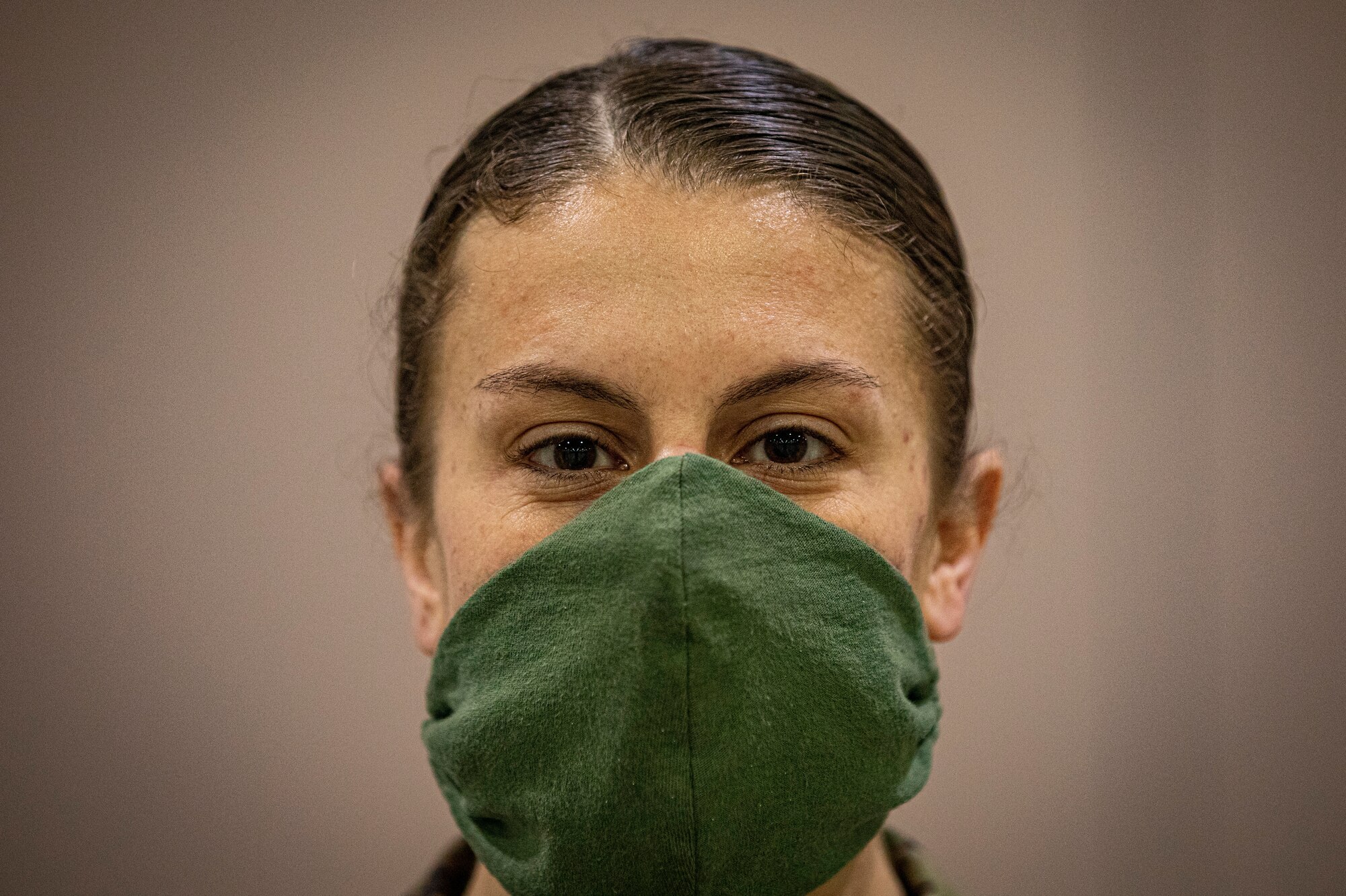 A New Jersey Air National Guard Airman stands for a portrait during the buildup of a Field Medical Station at the Atlantic City Convention Center in Atlantic City, N.J., April 9, 2020.  Atlantic City is one of three stations that will offer overflow from local hospitals focused on COVID-19 patients. (U.S. Air National Guard photo by Master Sgt. Matt Hecht)