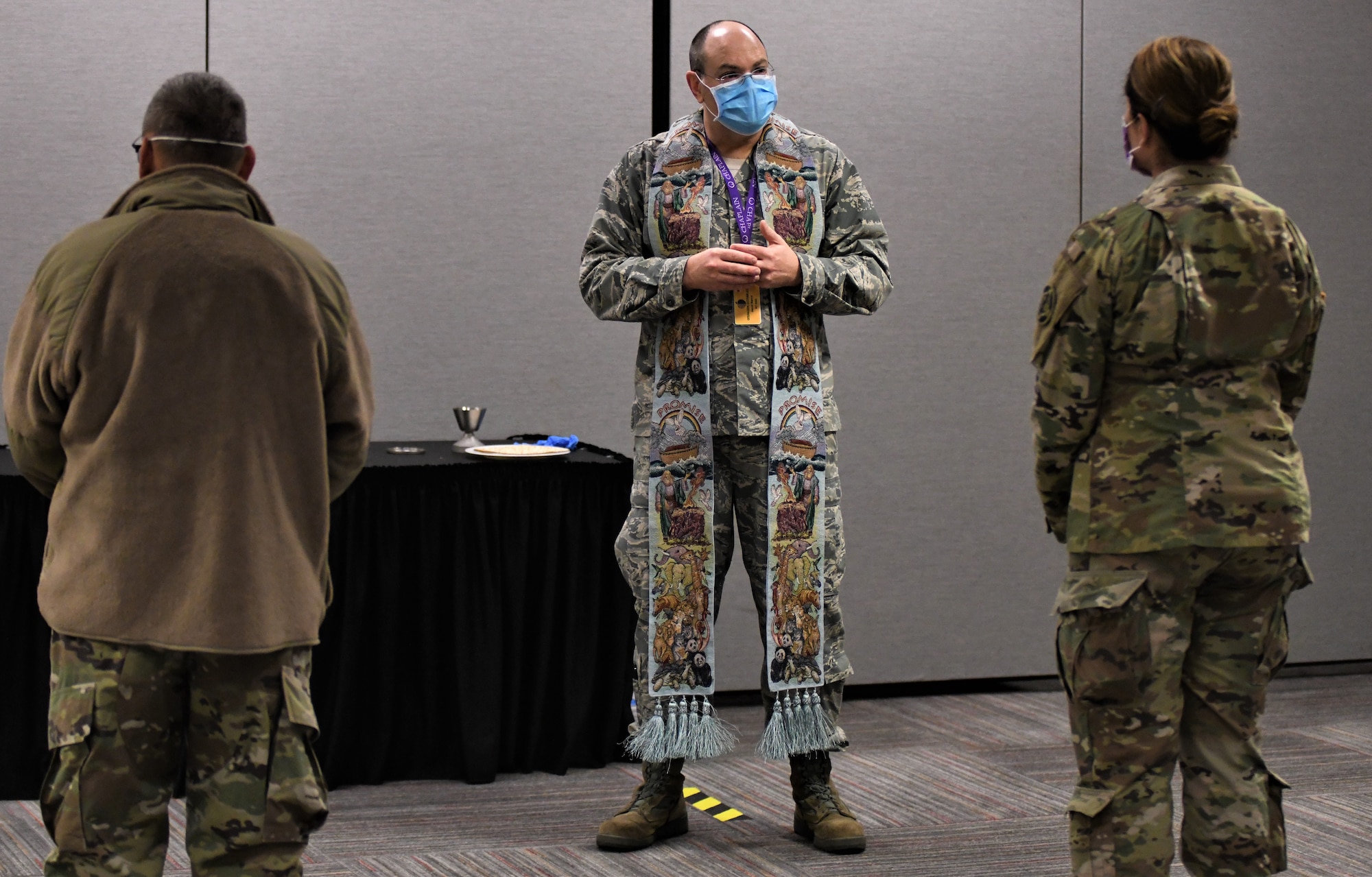 New York Air National Guard Chaplain (Lt. Col. ) Jacob Marvel conduct Easter Mass for service members at the Javits Convention Center in New York City while following social distancing guidelines on April 12, 2020. The New York National Guard, Federal Emergency Management Agency, and the Active Army have stood up the Javits New York Medical Station at the convention center to treat COVID-19 patients. ( U.S. Air National Guard photo by Major Patrick Cordova)