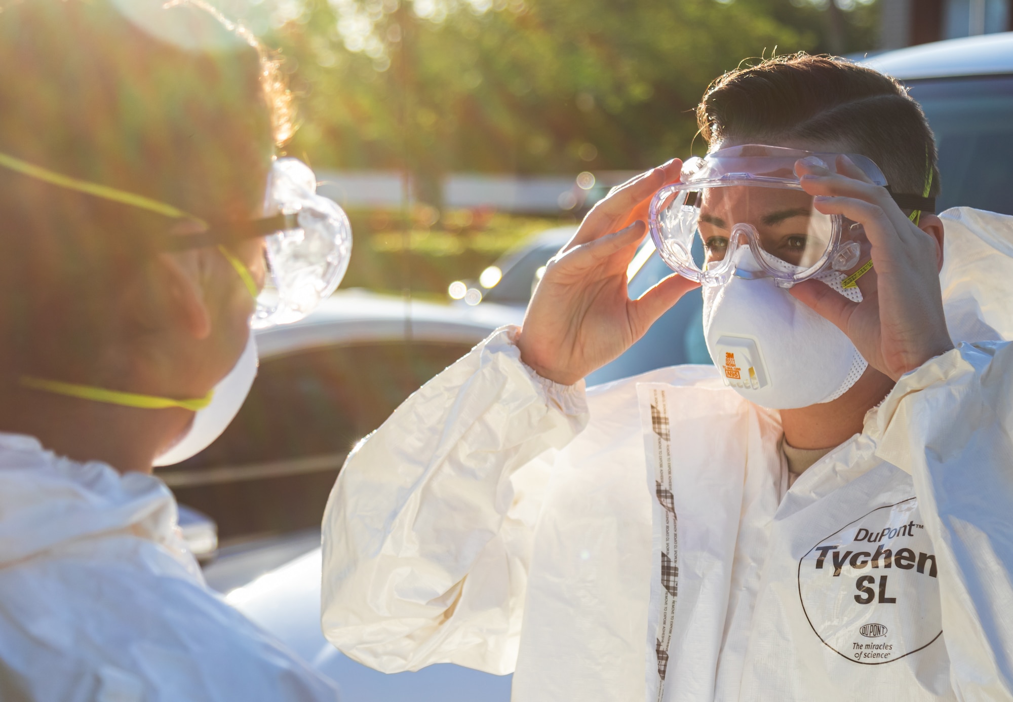 Airmen with the 125th Air Expeditionary Squadron dawn their personal protective equipment to prepare for their mobile testing team mission in central Florida. (U.S. Army Photo by Pvt. 1st Class Orion Oettel)