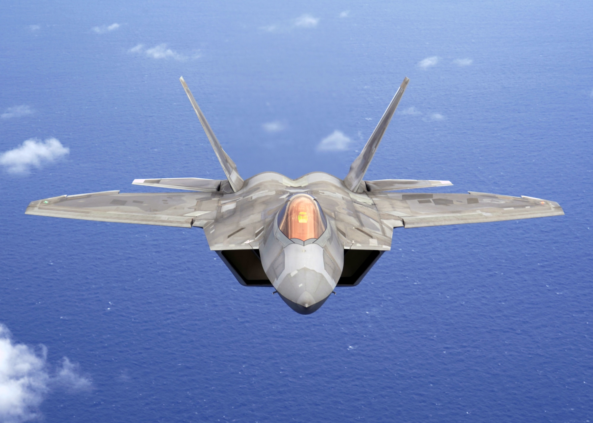 F-22 Hawaiian Raptor flies over Joint Base Pearl Harbor-Hickam, Hawaii, Dec. 5, 2019.