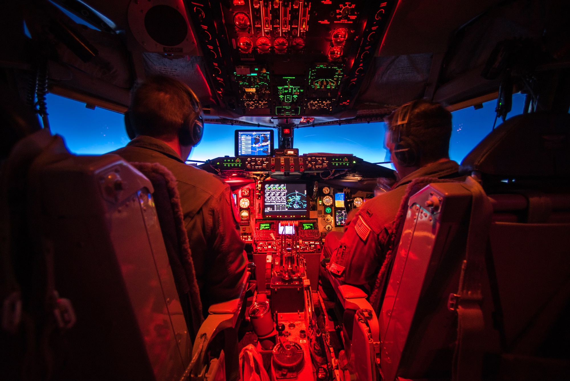 Capt. Jay Lamb and 2nd Lt. Johnathan Vargas, both pilots with the Wisconsin Air National Guard’s 128th Air Refueling Wing in Milwaukee, pilot a KC-135 Stratotanker transporting 115th Force Support Squadron Airmen from Truax Field, Wis., to Ramstein Air Base, Germany, Aug. 29, 2018. (U.S. Air National Guard photo by Airman 1st Class Cameron Lewis)