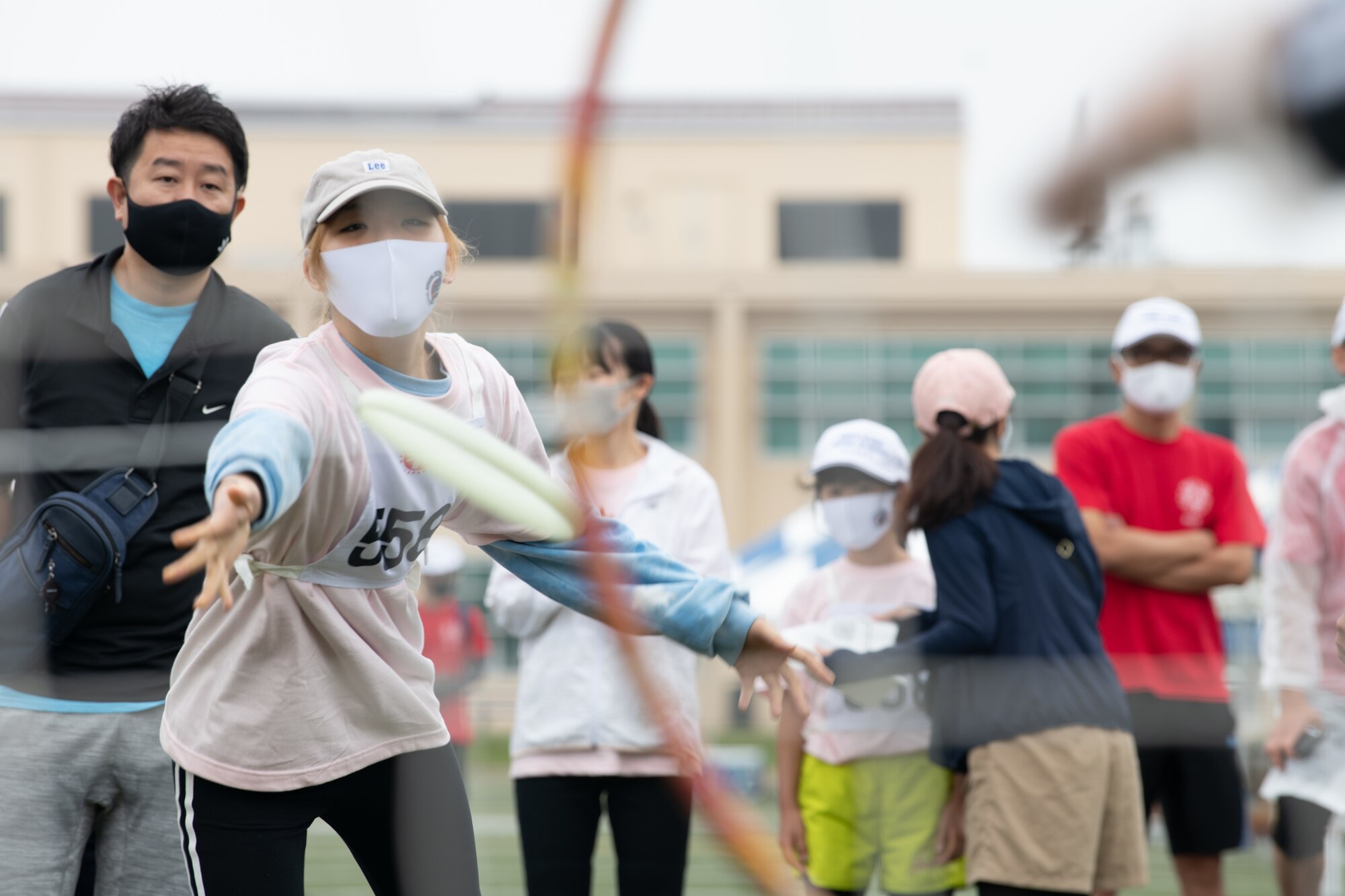 An athlete throws a disk during the Kanto Plains Special Olympics