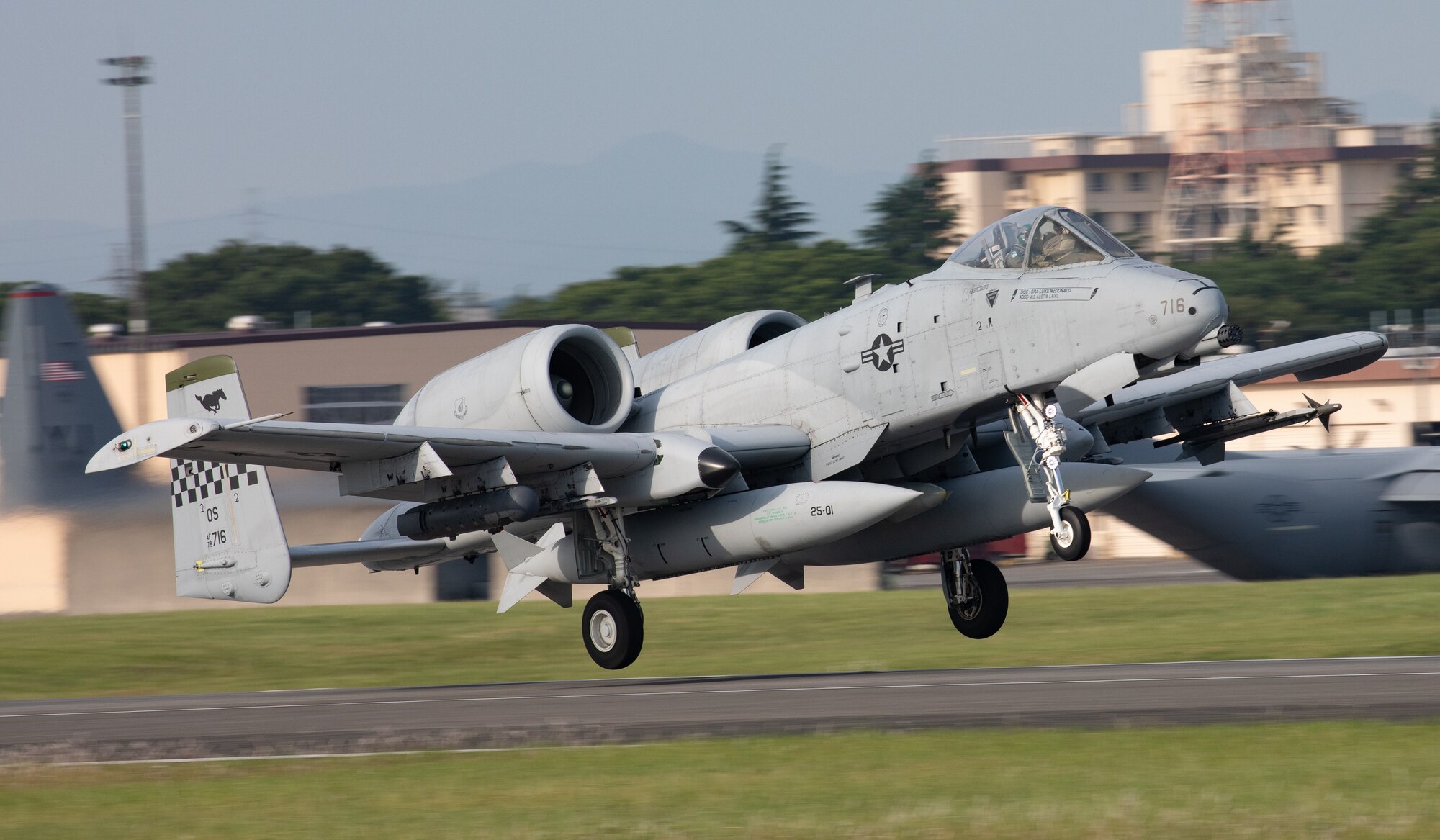 An A-10 Thunderbolt II aircraft takes off the flightline