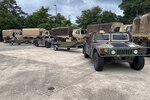 Louisiana National Guardsmen worked with local and state officials to combat rising floodwaters throughout the state following multiple days of steady rain since May 18, 2021. Using as many as 79 high-water vehicles and 19 boats, Guardsmen rescued 25 people and two pets in Lake Charles.