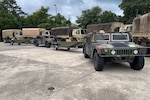 Louisiana National Guardsmen worked with local and state officials to combat rising floodwaters throughout the state following multiple days of steady rain since May 18, 2021. Using as many as 79 high-water vehicles and 19 boats, Guardsmen rescued 25 people and two pets in Lake Charles.