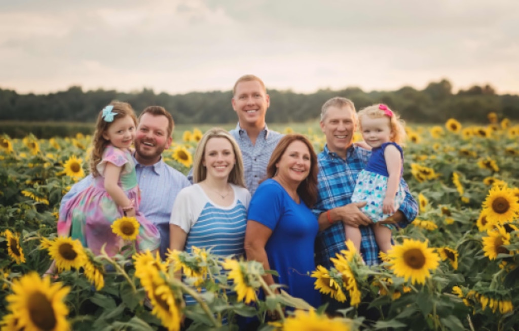 IN THE PHOTO, Darian Chasteen and his family. Chasteen recently passed away, losing a hard-fought battle with cancer. While he is physically no longer with the district, his legacy will live on through stories and memories forever.