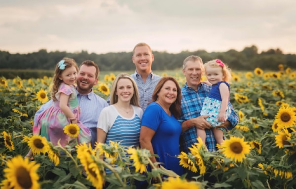 IN THE PHOTO, Darian Chasteen and his family. Chasteen recently passed away, losing a hard-fought battle with cancer. While he is physically no longer with the district, his legacy will live on through stories and memories forever.