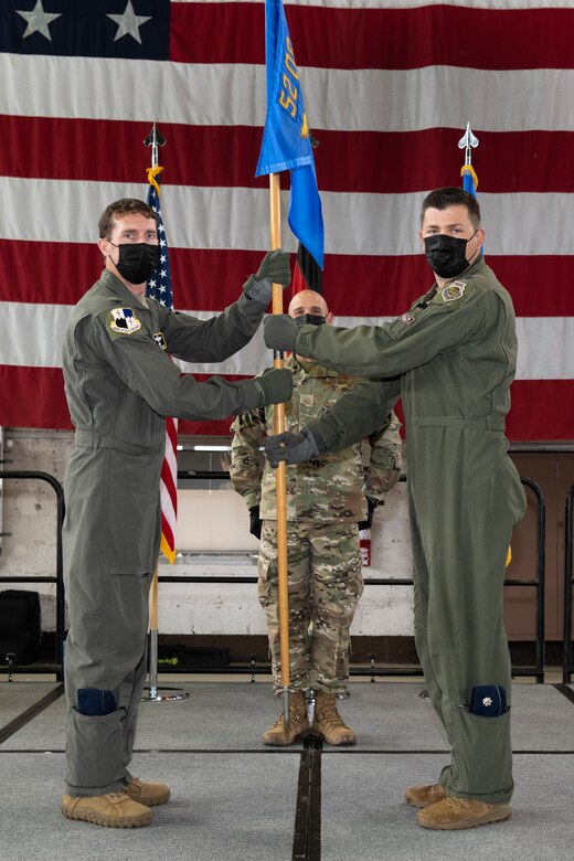 Guidon transfer during 52nd Operations Support Squadron change of command.