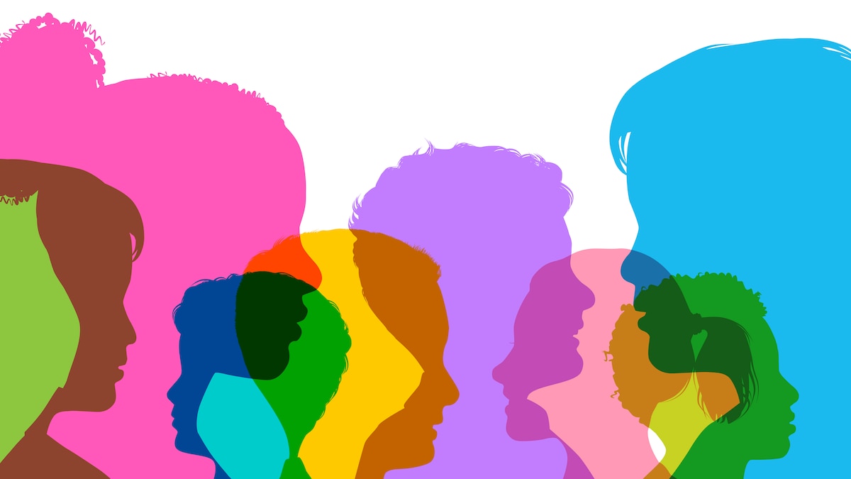 Colorful silhouettes of children's heads.