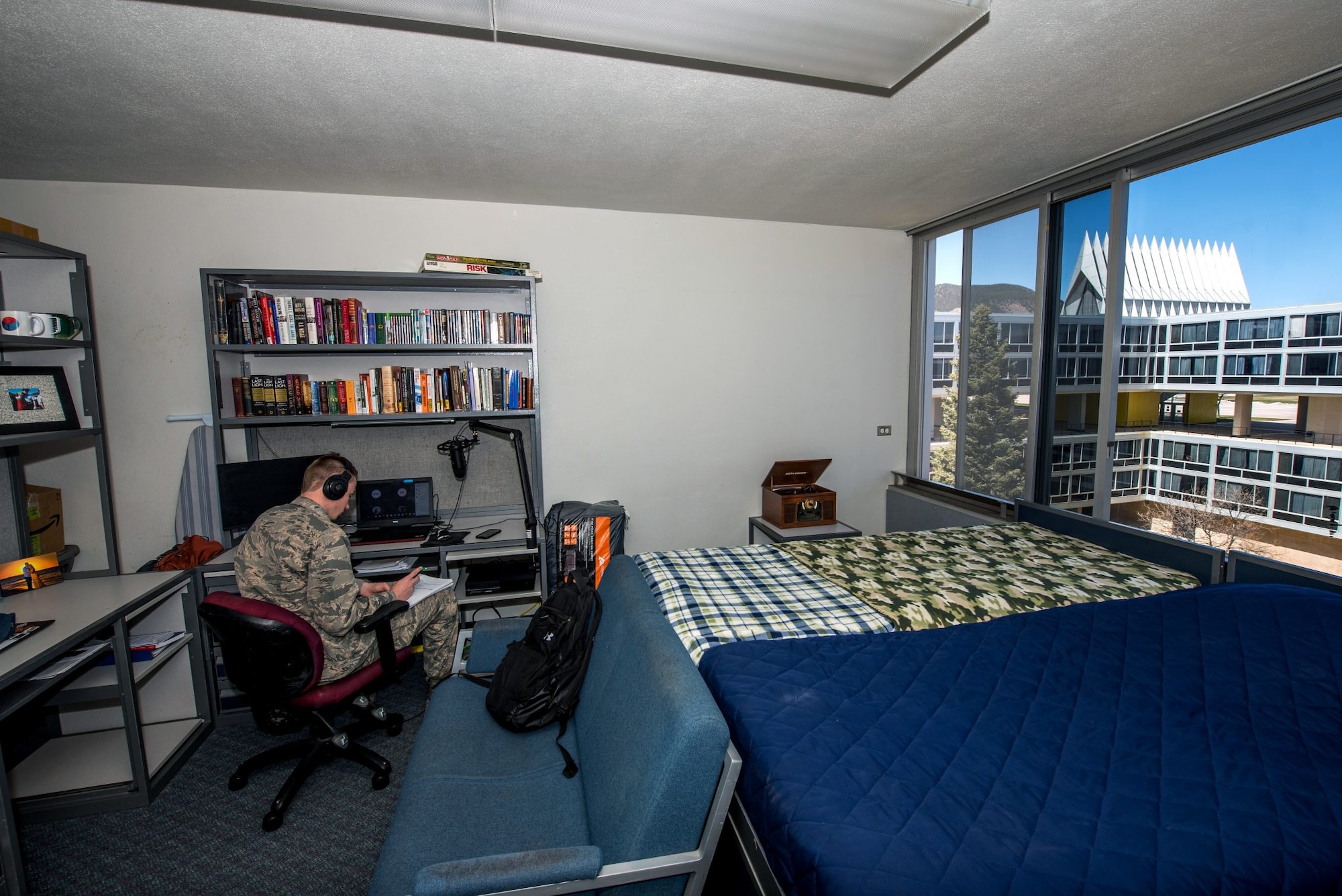 Walker Ince, a senior cadet, attends a class remotely on April 6, 2020 from his dorm room in Sijan Hall at the U.S. Air Force Academy. Due to Covid-19, freshman through junior year cadets were sent home to learn remotely while the senior class remained.