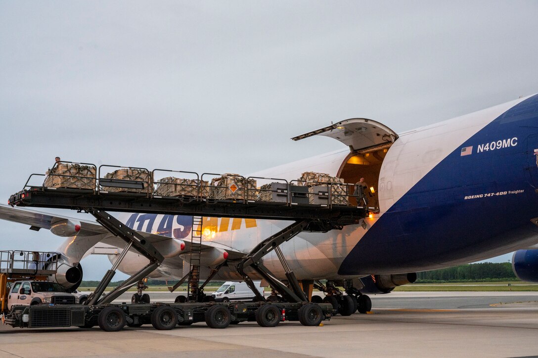 Airmen from the 436th Aerial Port Squadron load cargo onto an aircraft in support of a security assistance mission between the U.S. and Ukraine at Dover Air Force Base, Delaware, May 24, 2021. The U.S. and Ukraine first initiated a partnership in 1993. Missions such as this demonstrate the U.S.’s commitment to Ukraine’s independence, sovereignty and territorial integrity. (U.S. Air Force photo by Airman 1st Class Cydney Lee)