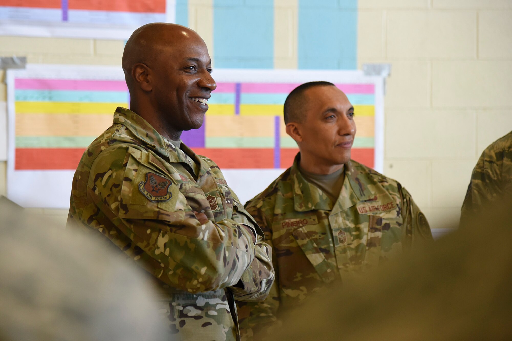 Chief Master Sgt. of the Air Force Kaleth O. Wright and Chief Master Sgt. Manny Piñeiro, Air Force first sergeant special duty manager, meet with 92nd and 141st Maintenance Group Airmen to discuss the streamlining of the periodic inspection process at Fairchild Air Force Base, March 22, 2019. The periodic inspection is the most in-depth inspection Fairchild maintainers conduct on the KC-135 Stratotanker. The two-week inspection is conducted every 24 months, 1,800 flight hours or 1,000 landings. (U.S. Air Force photo by Staff Sgt. Mackenzie Mendez)