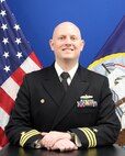 Studio portrait of Cmdr. Timothy Battles