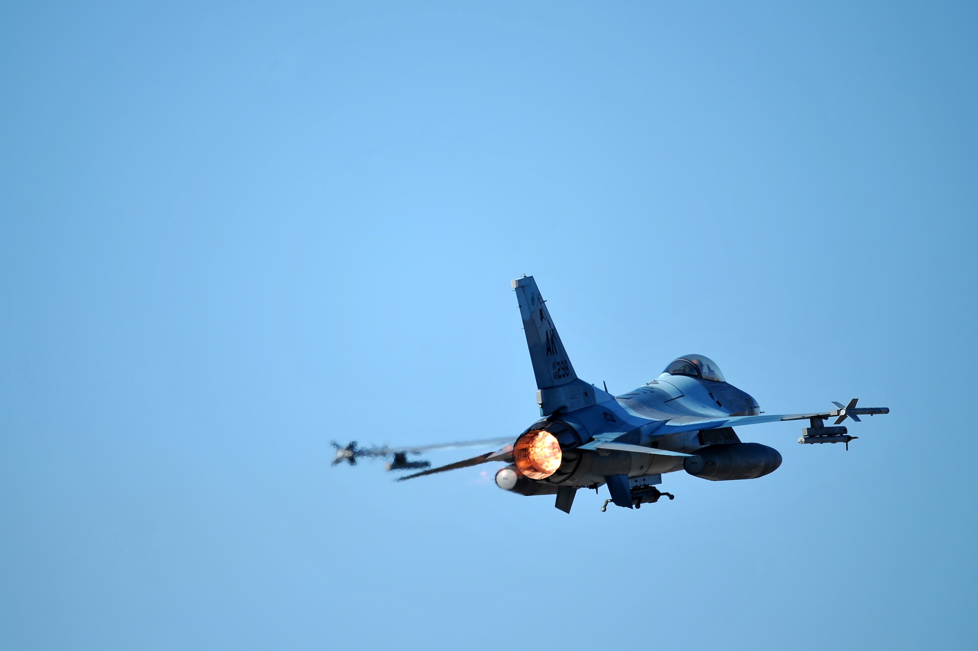 An F-16 Fighting Falcon takes off Sept. 25, 2014, during Distant Frontier at Eielson Air Force Base, Alaska. The F-16 is assigned to the 18th Aggressor Squadron. Aggressor pilots are trained to act as opposing forces in Red Flag-Alaska, to prepare U.S. and allied forces for real-world aerial combat. (U.S. Air Force photo/Staff Sgt. Jim Araos)