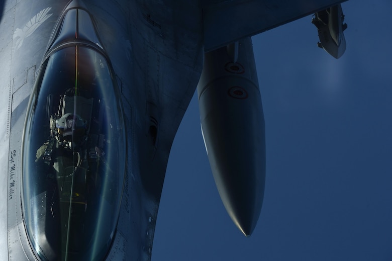 A KC-135 Stratotanker, assigned to the 63rd Air Refueling Squadron at MacDill Air Force Base, Fla., refuels an F-16 Fighting Falcon, assigned to the 480th Expeditionary Fighter Squadron at Spangdahlem Air Base, Germany, during a flying training deployment at Souda Bay, Greece, Feb. 2, 2016. The 63rd ARS operated out of Souda Bay Naval Air Station for the duration of the flying training deployment. (U.S. Air Force photo/Staff Sgt. Christopher Ruano)