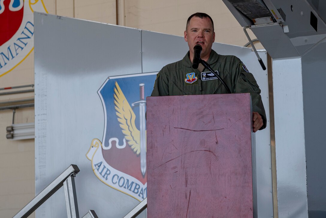 Photo of an Airman making remarks during a ceremony