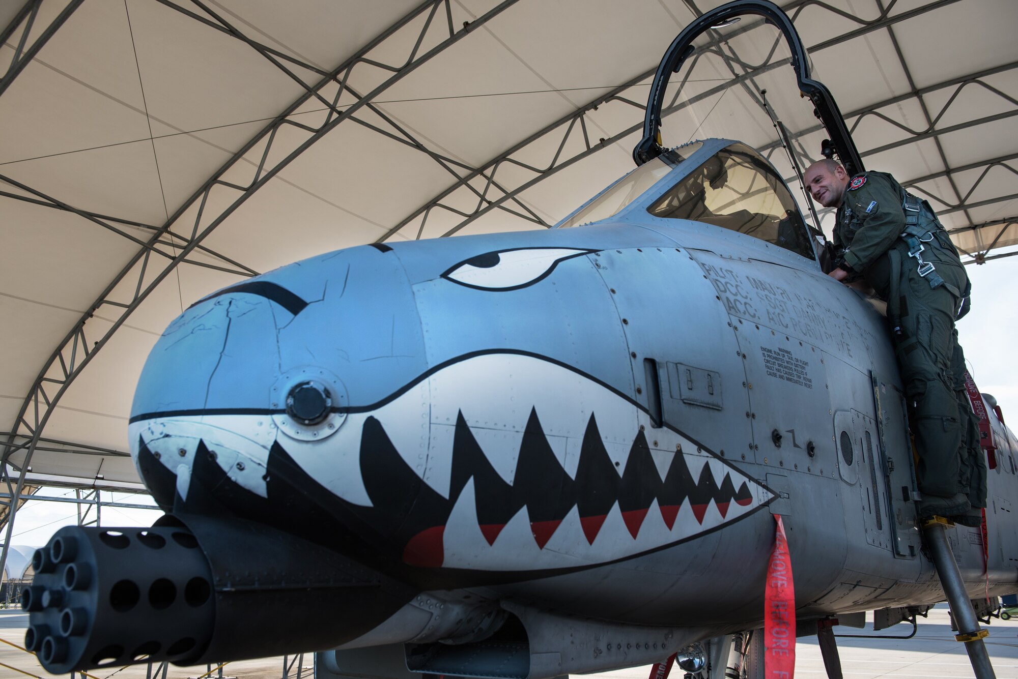 Capt. "Pinna", an Italian air force exchange pilot with the 74th Fighter Squadron, climbs into a U.S. Air Force A-10 Thunderbolt II, Moody AFB, Jan. 16, 2018. The Military Personnel Exchange program provides officers with the opportunity to participate in personnel exchanges with over 30 countries. (U.S. Air Force photo by Tech. Sgt. Greg C. Biondo)