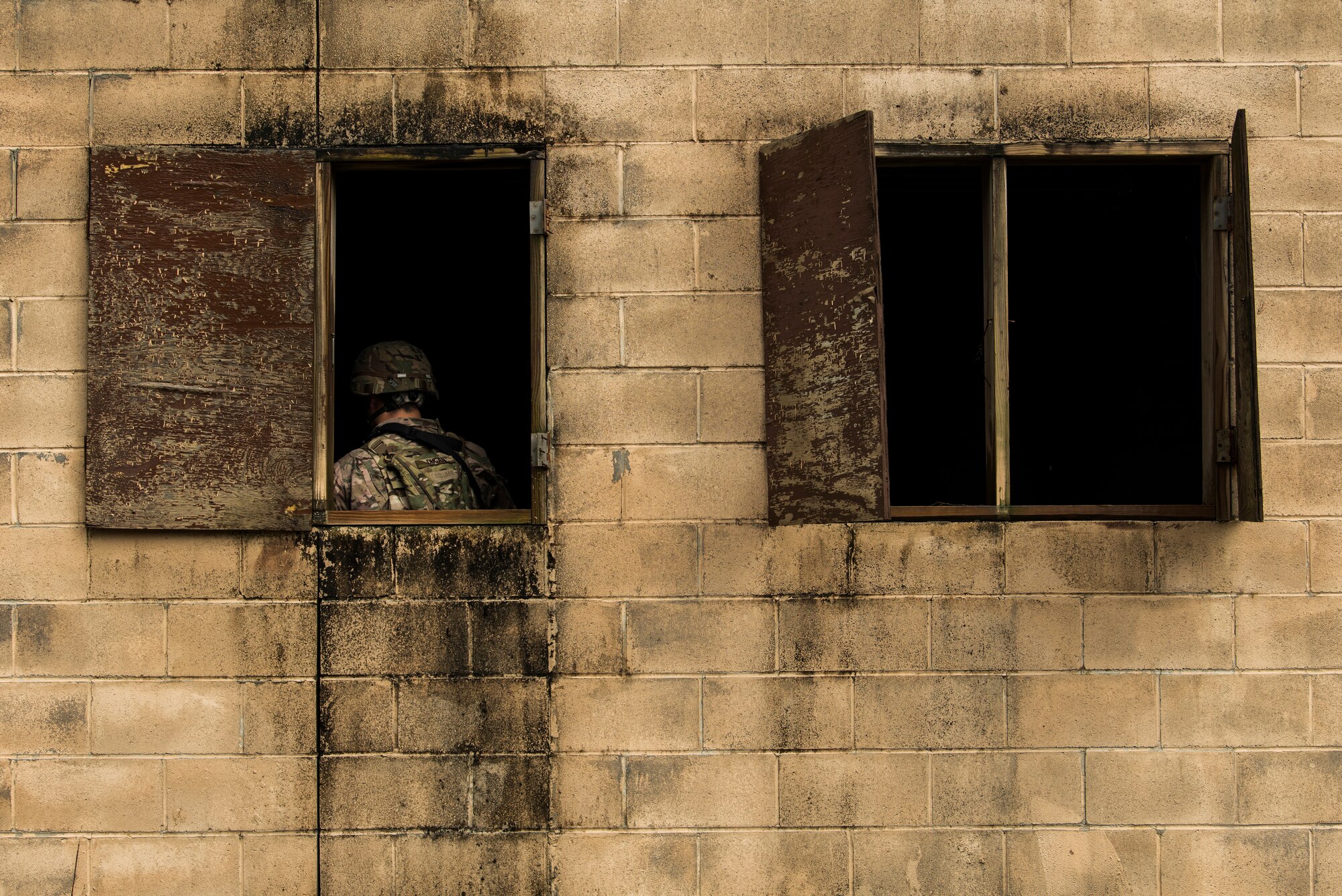 A member of the 823rd Base Defense Squadron during a close quarters battle scenario, Moody Air Force Base, Jan. 12, 2018. The 823rd is one of three operational security forces squadrons under the 820th Base Defense Group whose mission is to provide high-risk force protection and integrated base defense for expeditionary forces. (U.S. Air Force photo by Bennie J. Davis III)