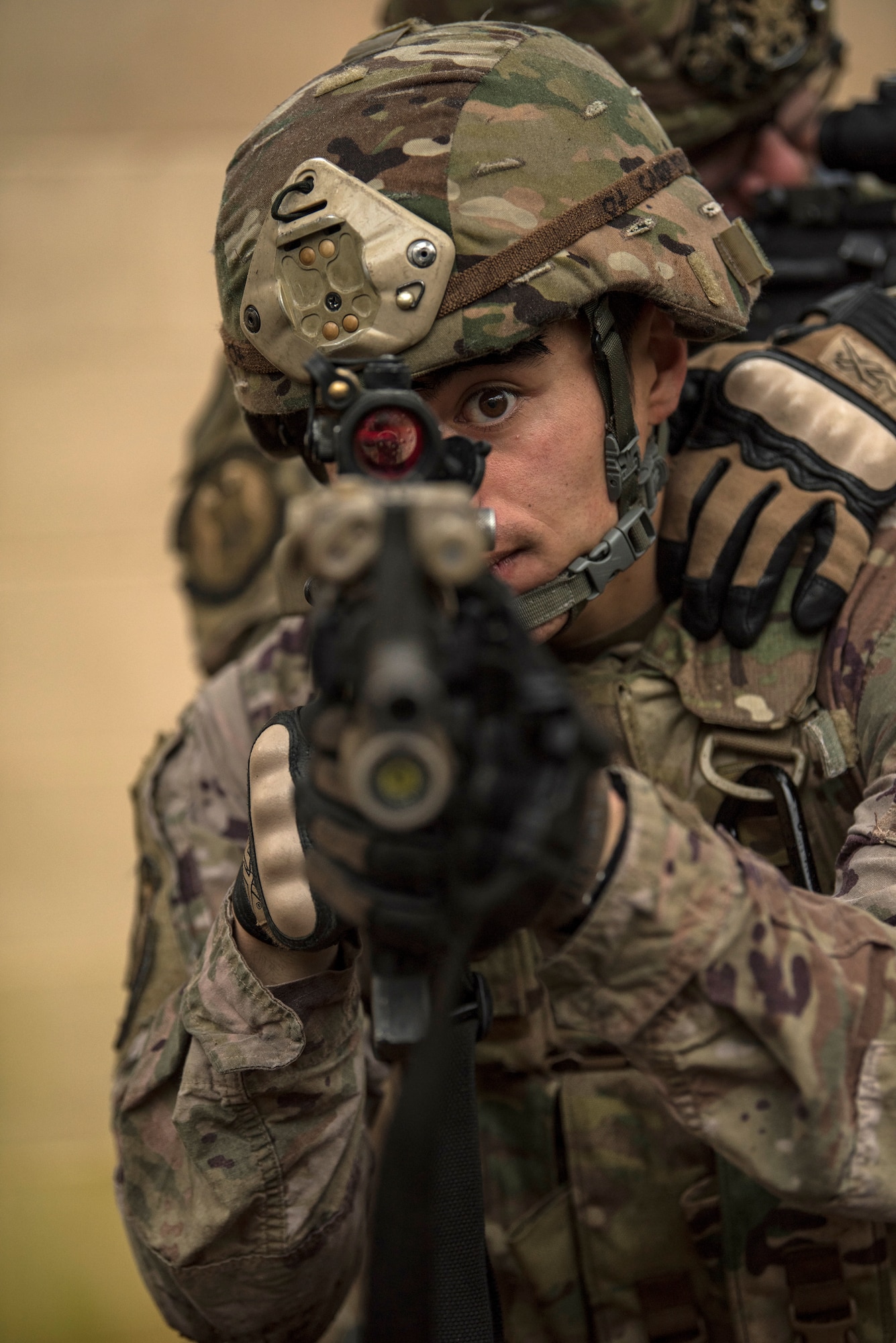 A member of the 823rd Base Defense Squadron looks through the optic of an M-4 carbine during a training scenario, Moody Air Force Base, Jan. 12, 2018. The 823rd is one of three operational security forces squadrons under the 820th Base Defense Group whose mission is to provide high-risk force protection and integrated base defense for expeditionary forces. (U.S. Air Force photo by Bennie J. Davis III)