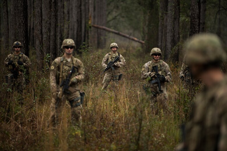 Members of the 823rd Base Defense Squadron for enemy forces during a training scenario, Moody Air Force Base, Jan. 12, 2018. The 823rd is one of three operational security forces squadrons under the 820th Base Defense Group whose mission is to provide high-risk force protection and integrated base defense for expeditionary forces. (U.S. Air Force photo by Bennie J. Davis III)