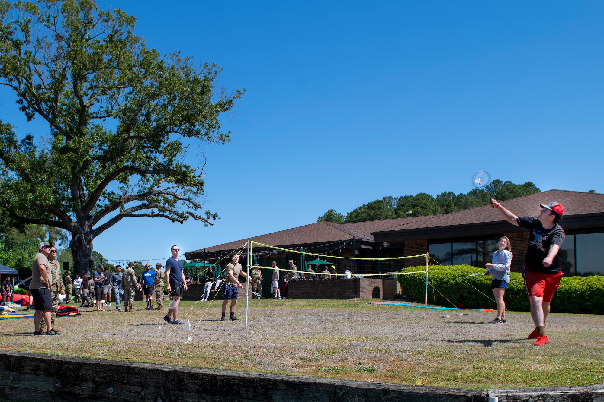 Members of Team Seymour gather to play badminton at the Outdoor Recreation Adventure Park, on Seymour Johnson Air Force Base, North Carolina, May 14, 2021.