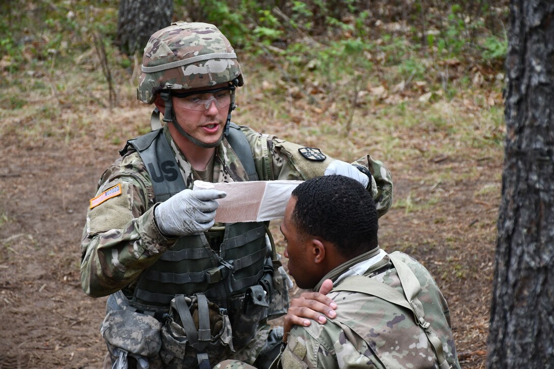 Soldiers test for Expert Field Medical Badge at Fort McCoy