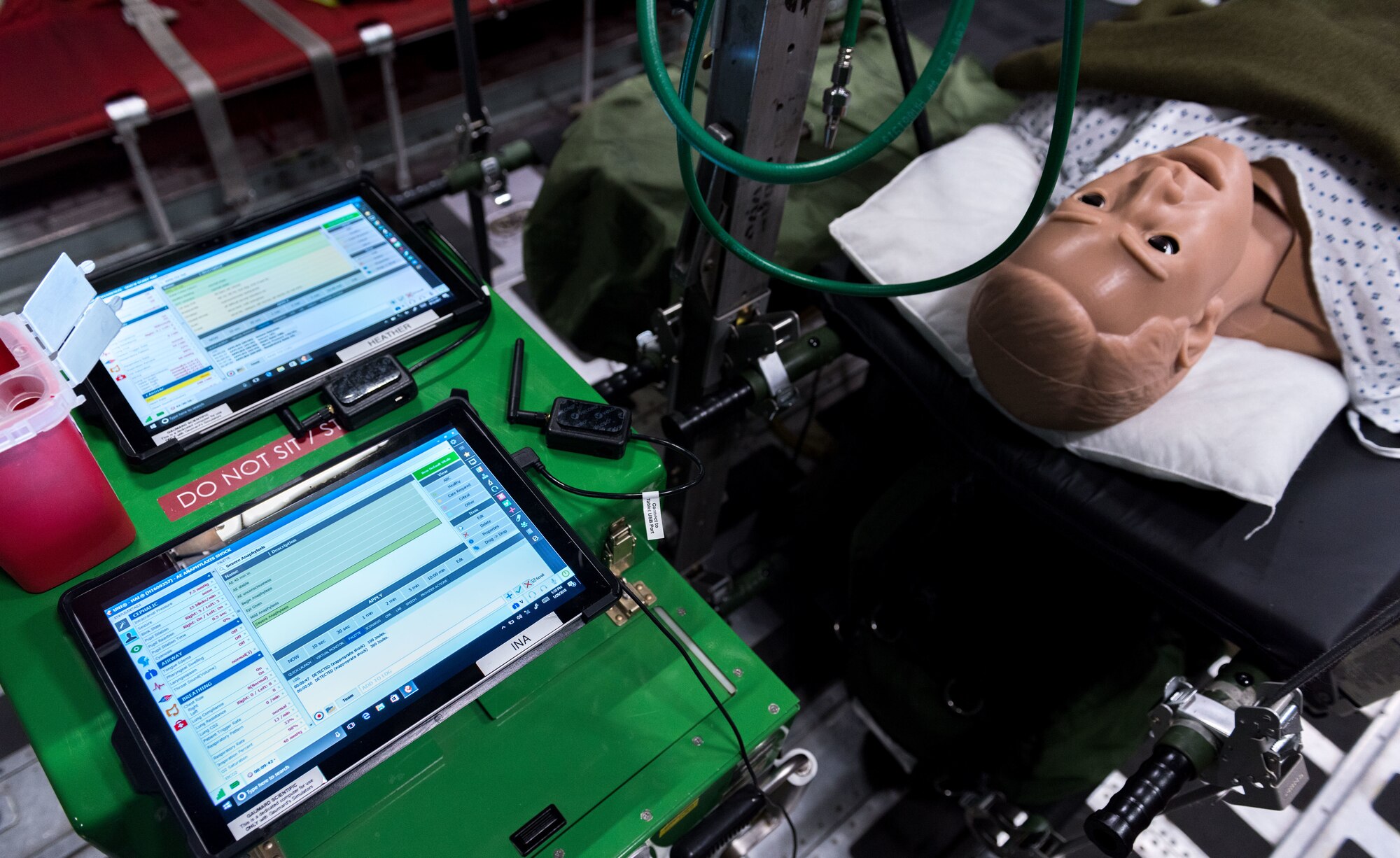 A patient simulator, which can blink, speak, bleed and allow students to monitor vital signs and administer drugs, is used for aeromedical evacuation training by active-duty, reserve and ANG Airmen, as well as, members of other services and partner nations, aboard C-17 and C-130 mockups during the Flight Nurse and Aeromedical Technician Course at the 711th Human Performance Wing's U.S. Air Force School of Aerospace Medicine at Wright Patterson AFB, Ohio, Jan. 29, 2018. (U.S. Air Force photo by J.M. Eddins Jr.)