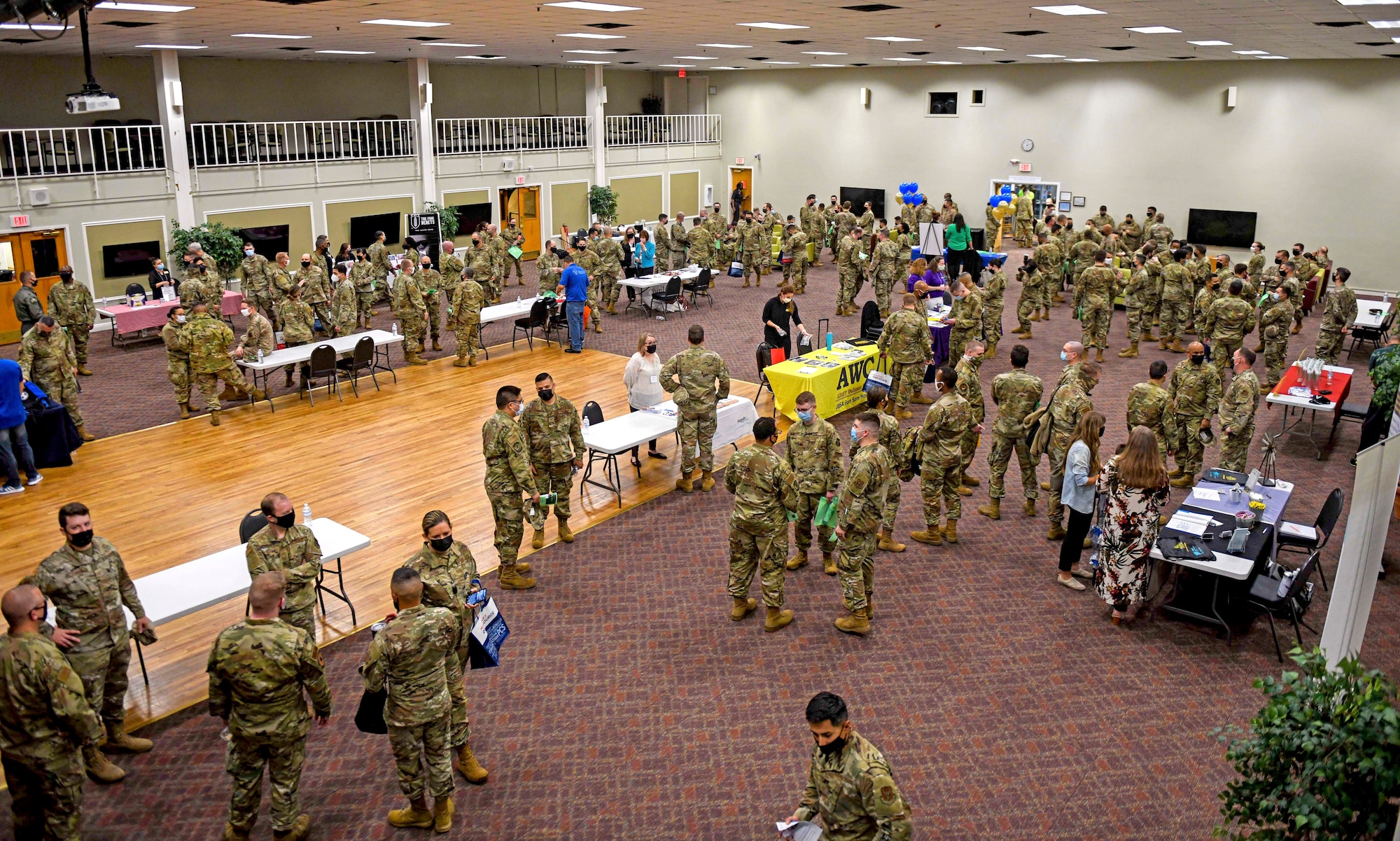 At Joint Base San Antonio-Lackland, Texas, Airmen and their families visit resource booths during the 960th Cyberspace Wing Mental Health and Resiliency Fair, May 1, 2021. (U.S. Air Force photo by Airman First Class Tyler McQuiston)