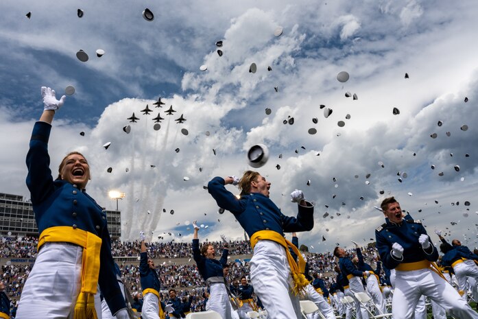 The U.S. Air Force Air Demonstration Squadron "Thunderbirds" perform a fly-over at the Air Force Academy graduation at Falcon Stadium in Colorado Springs, Colo., May 26, 2021. In all, 1,019 cadets graduated in front of a select crowd due to safety and health precautions set in place for the ceremony as the Academy continues to operate during the pandemic. (U.S. Air Force photo by Staff. Sgt Laurel M. Richards)