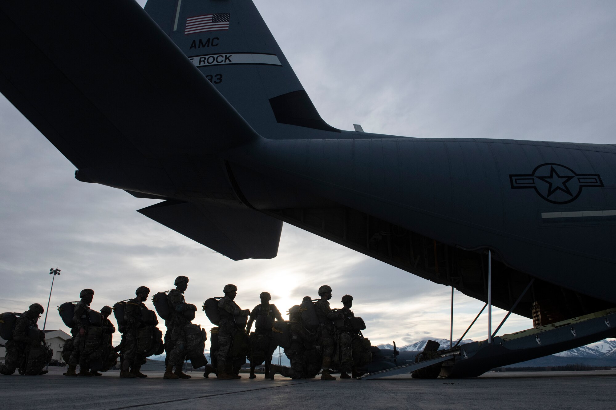 Soldiers board a C-130J