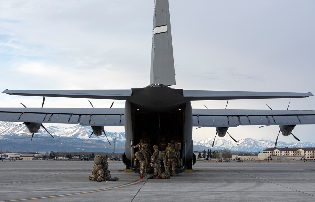 Soldiers board a C-130J
