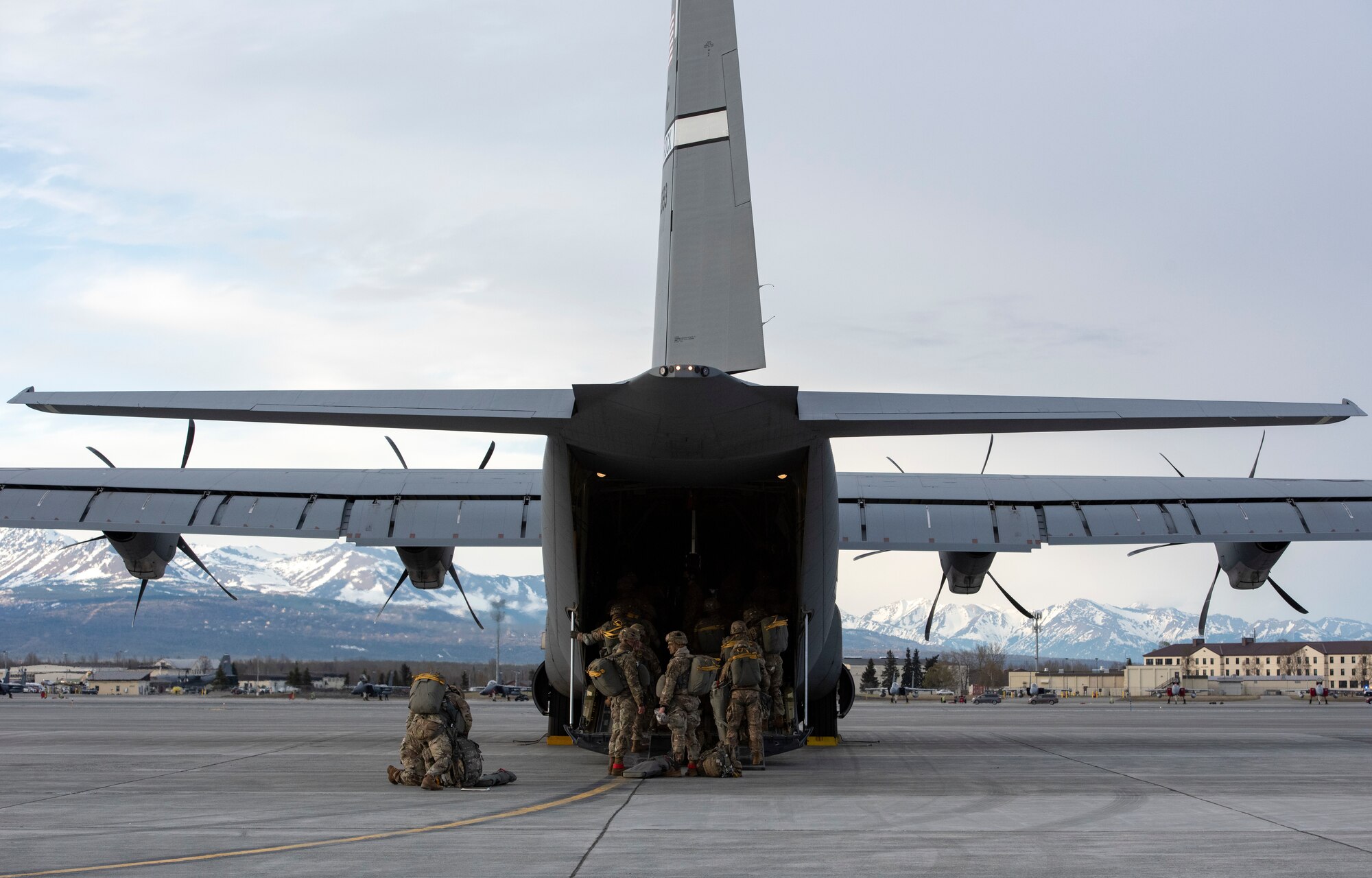 Soldiers board a C-130J