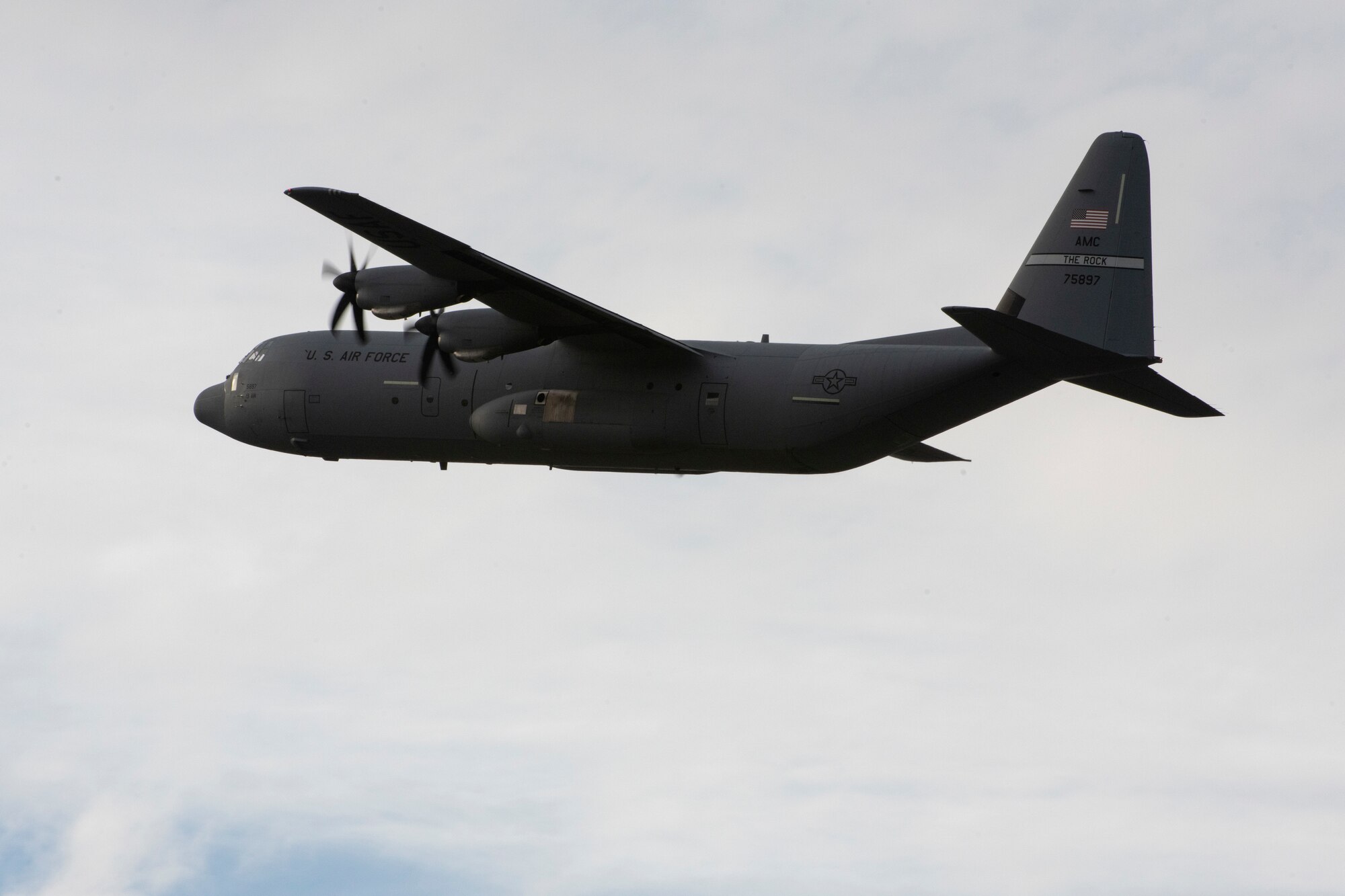 A C-130J takes off