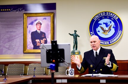 Adm. Christopher W. Grady, commander, U.S. Fleet Forces Command, (USFFC) speaks about the importance of mine warfare as the keynote speaker on the second day of the 14th International Mine Technology Symposium (virtual), May 26, 2021.