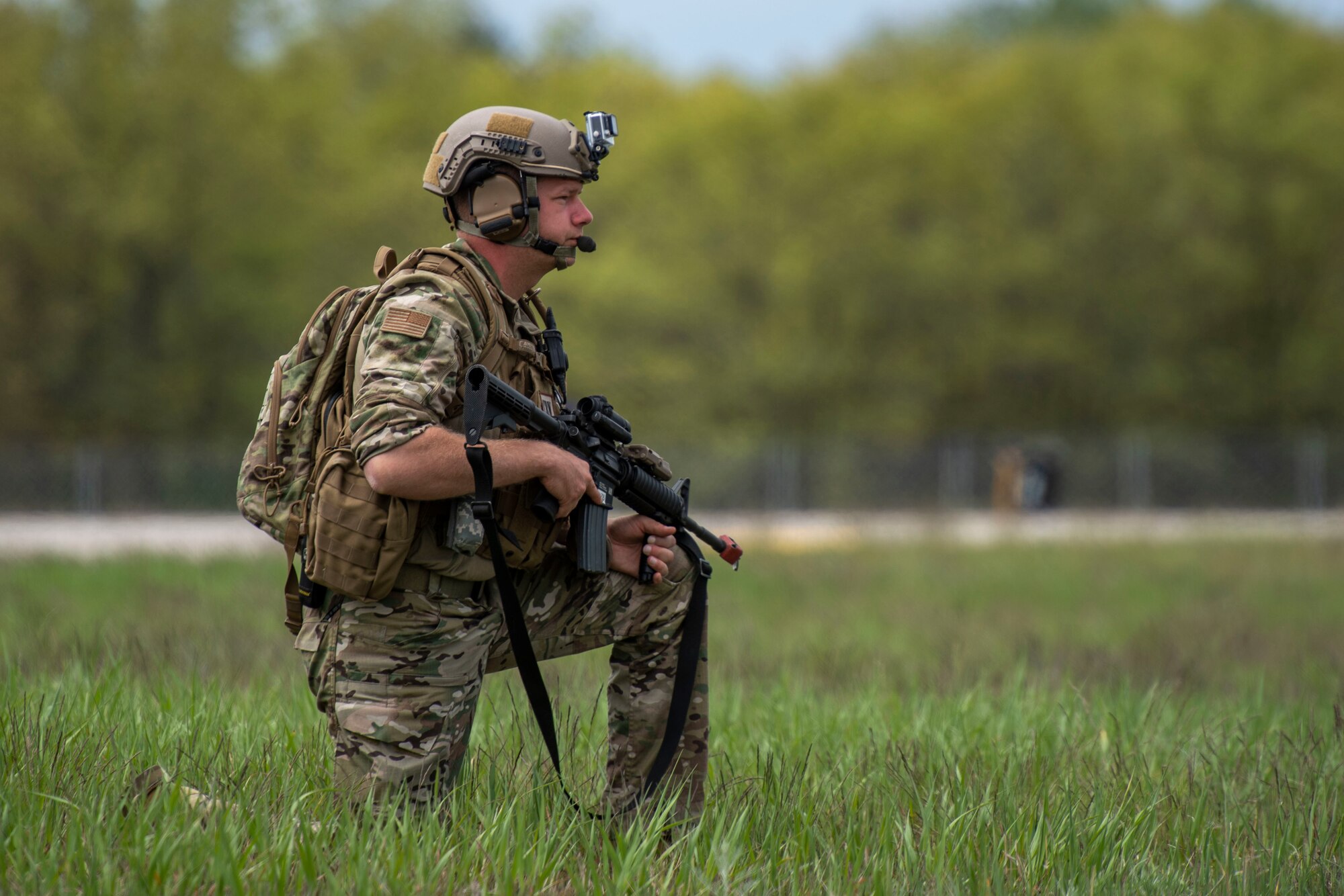 Master Sgt. Lee Boston, 321st Contingency Response Squadron contingency location team lead, secures a refueling area at Alpena Combat Readiness Training Center, Michigan, May 24, 2021, in support of Exercise Mobility Guardian 2021. Mobility Guardian tests Mobility Airmen through a challenging, realistic and detailed scenario based on relevant real-world security challenges. (U.S. Air Force photo by Senior Airman Aaron Irvin)