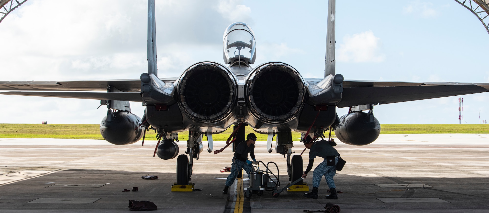 Republic of Singapore air force airmen assigned to the 807 Squadron perform post-flight maintenance on a RSAF F-15SG during a deployment at Andersen Air Force Base, Guam, May 24, 2021. The training opportunity in Guam is a reflection of long-standing bilateral defense relations between Singapore and the U.S.