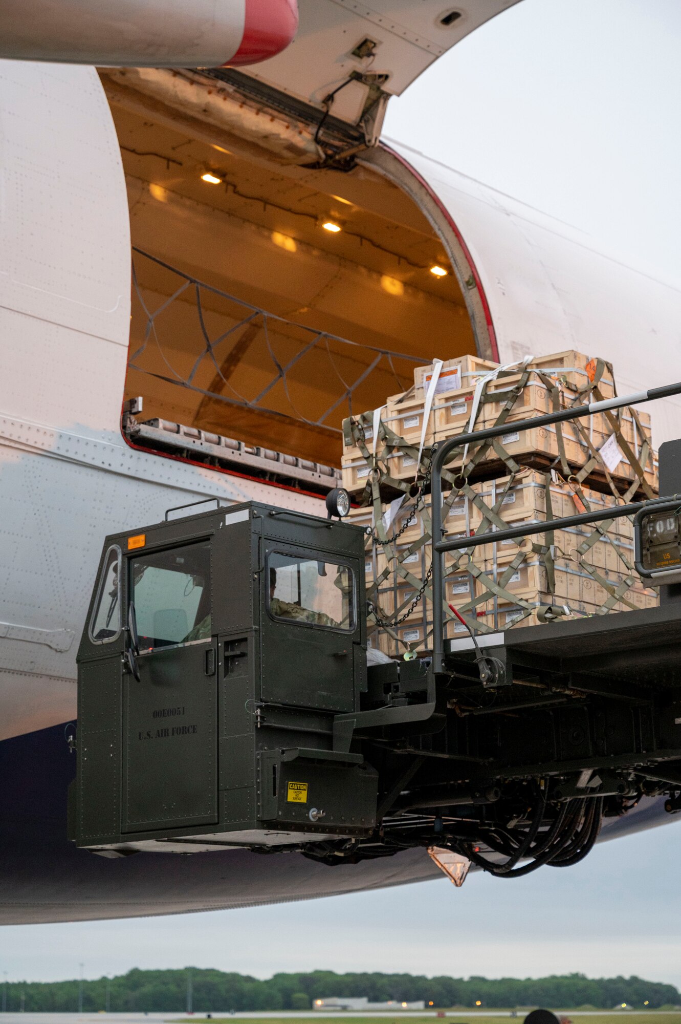 Cargo is loaded onto an aircraft in support of a security assistance mission between the U.S. and Ukraine at Dover Air Force Base, Delaware, May 24, 2021. The U.S. and Ukraine first initiated a partnership in 1993. Missions such as this demonstrate the U.S.’s commitment to Ukraine’s independence, sovereignty and territorial integrity. (U.S. Air Force photo by Airman 1st Class Cydney Lee)
