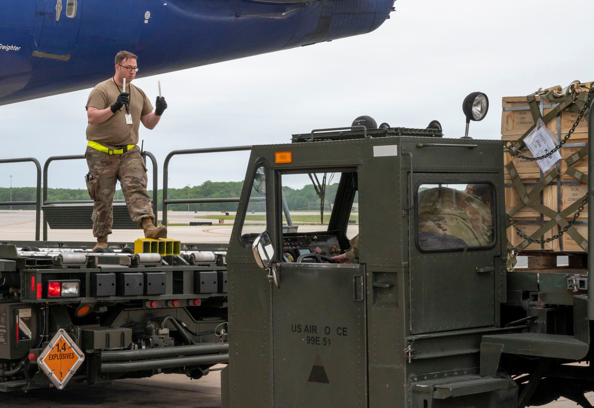 Staff Sgt. Joshua Sawyer, 436th Aerial Port Squadron ramp operations supervisor, marshals a K-loader in support of a security assistance mission between the U.S. and Ukraine at Dover Air Force Base, Delaware, May 24, 2021. The U.S. and Ukraine first initiated a partnership in 1993. Missions such as this demonstrate the U.S.’s commitment to Ukraine’s independence, sovereignty and territorial integrity. (U.S. Air Force photo by Airman 1st Class Cydney Lee)
