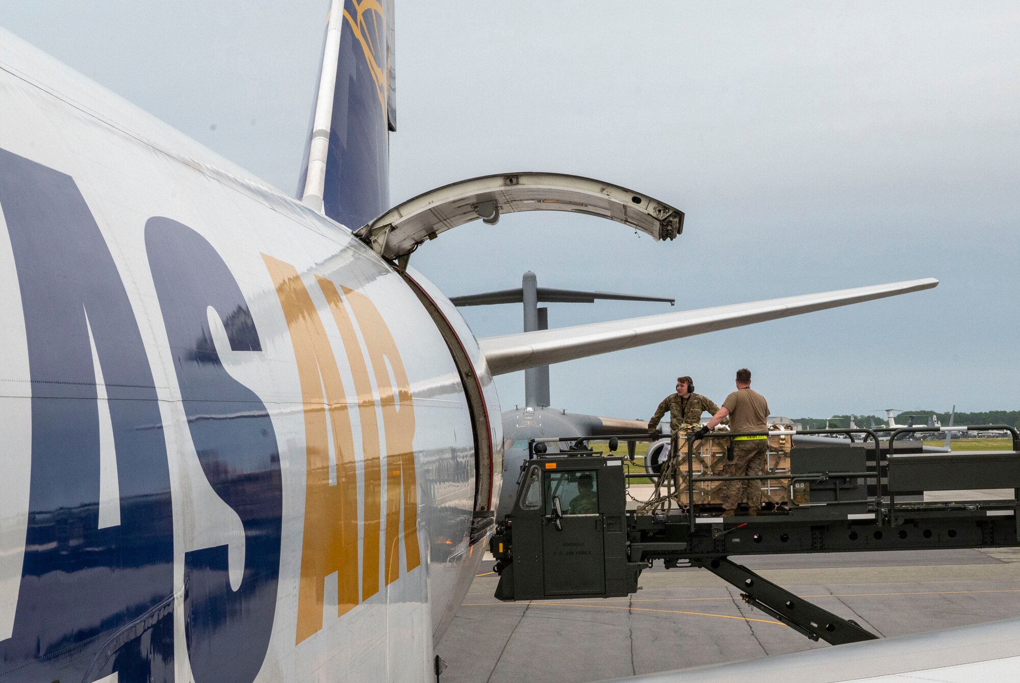 Airmen from the 436th Aerial Port Squadron load cargo onto an aircraft in support of a security assistance mission between the U.S. and Ukraine at Dover Air Force Base, Delaware, May 24, 2021. The U.S. and Ukraine first initiated a partnership in 1993. Missions such as this demonstrate the U.S.’s commitment to Ukraine’s independence, sovereignty and territorial integrity. (U.S. Air Force photo by Airman 1st Class Cydney Lee)