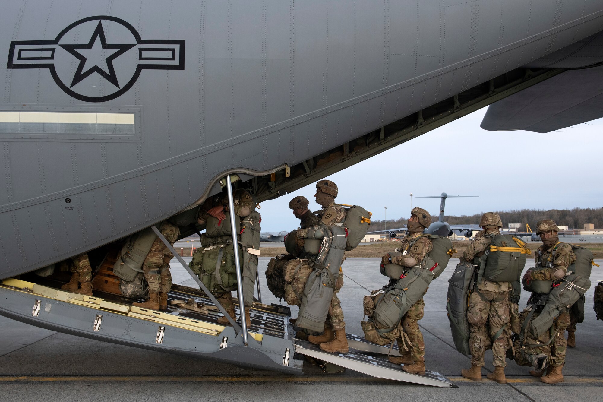 Soldiers board a C-130J