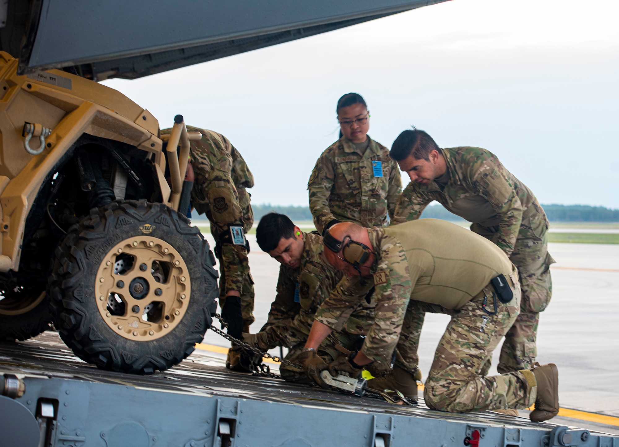 Air Transportation specialists assigned to the 437th Maintenance Squadron load MRZR Tactical Warfighters onto a C-17 Globemaster during Exercise Mobility Guardian at Alpena Combat Readiness Training Center, Michigan, May 25, 2021. Mobility Guardian includes Air Mobility Command’s first large-scale training on Agile Combat Employment and the employment of Multi-Capable Airmen. (U.S. Air Force photo by Airman 1st Class Matthew Porter)