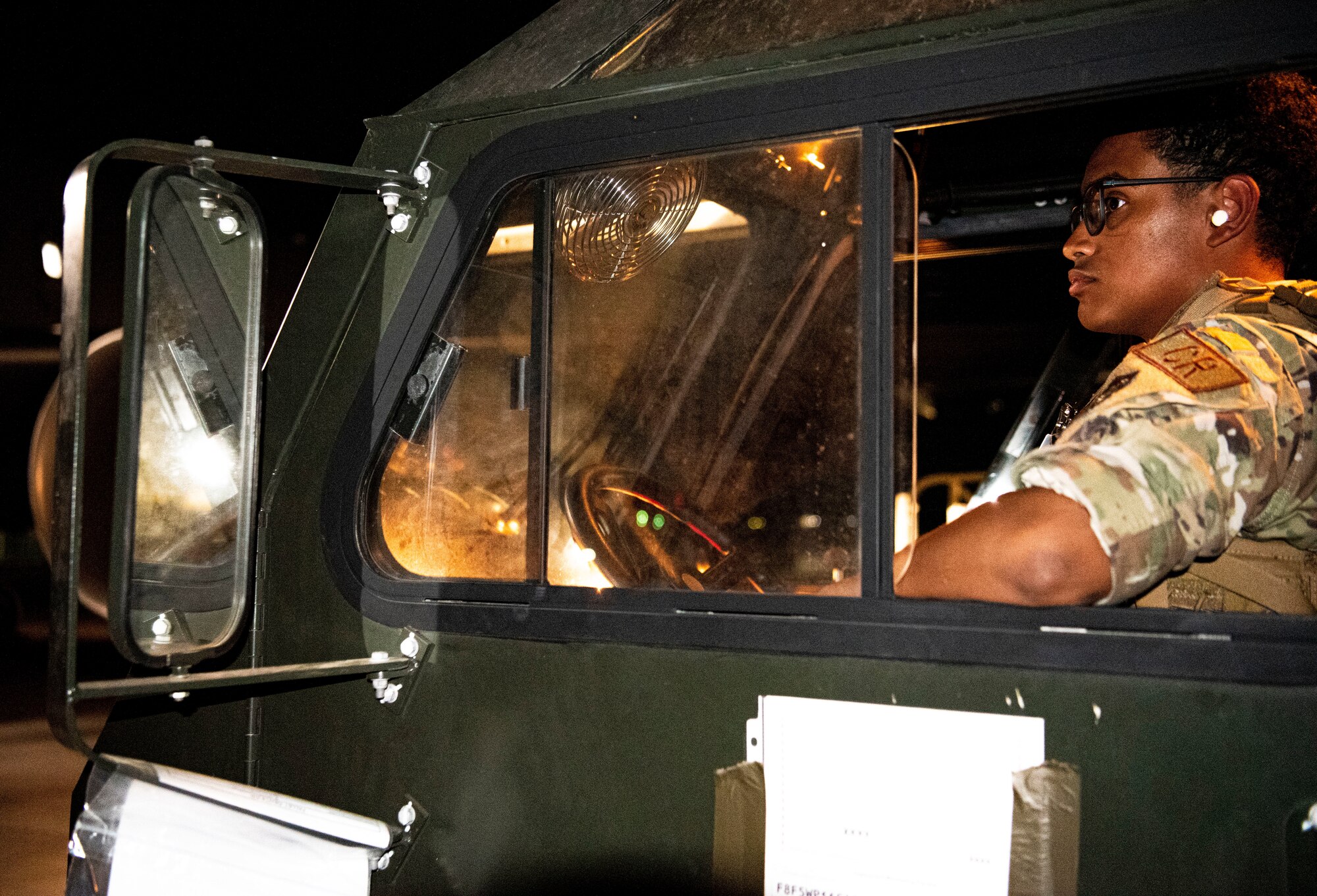 U.S. Air Force Airman 1st Class Natel Gebretsadik, 821st Contingency Response Squadron air transportation specialist, waits to upload medical supplies to a KC-46 Pegasus May 22, 2021, during Exercise Mobility Guardian 2021 at Oscoda-Wurtsmith Airport, Oscoda, Michigan. Mobility Guardian is a training exercise to prepare Airmen to face real-world security challenges and sustain strategic deterrence anywhere and at any time. (U.S. Air Force photo by Airman 1st Class Matthew Porter)