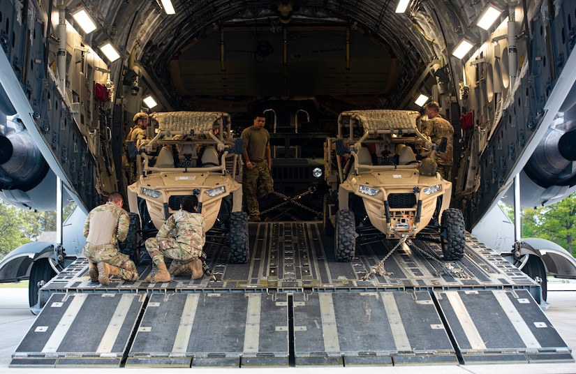 Air Transportation specialists assigned to the 437th Maintenance Squadron load MRZR Tactical Warfighters onto a C-17 Globemaster during Exercise Mobility Guardian at Alpena Combat Readiness Training Center, Michigan, May 25, 2021. Mobility Guardian includes Air Mobility Command’s first large-scale training on Agile Combat Employment and the employment of Multi-Capable Airmen. (U.S. Air Force photo by Airman 1st Class Matthew Porter)