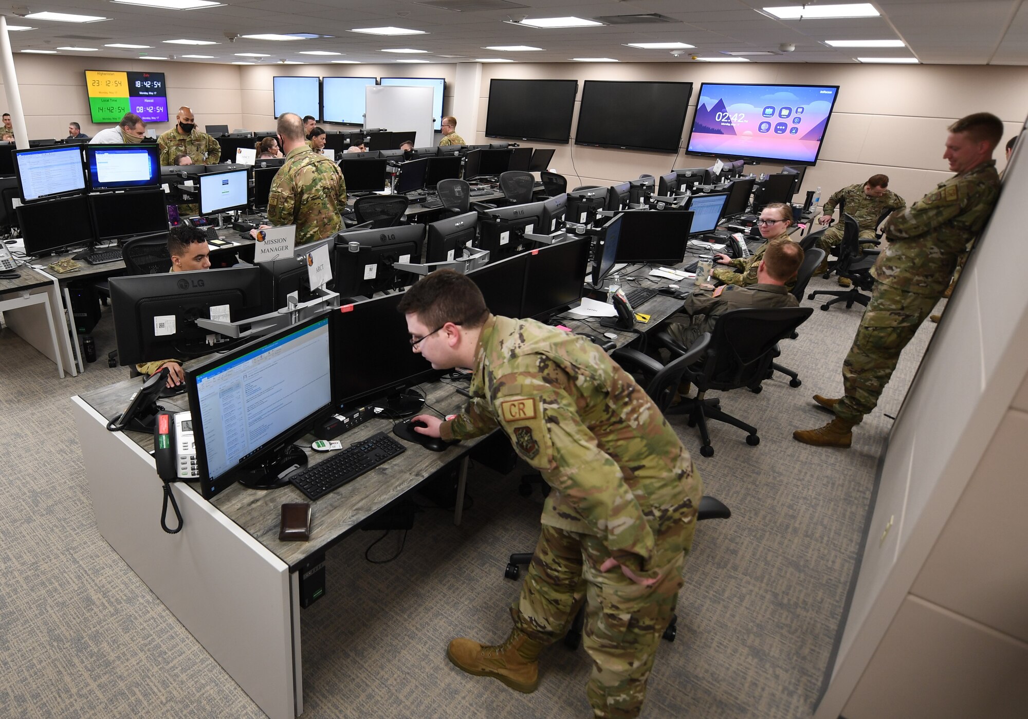 Airmen with the 621st Air Mobility Operations Squadron participate in exercise Mobility Guardian May 17, 2021 at Joint Base McGuire-Dix-Lakehurst, New Jersey. The Airmen are executing air operations remotely from their weapon system suite in support of exercise Mobility Guardian, Air Mobility Command’s largest and longest readiness exercise. (U.S. Air Force photo by Tech Sgt. Luther Mitchell Jr.)