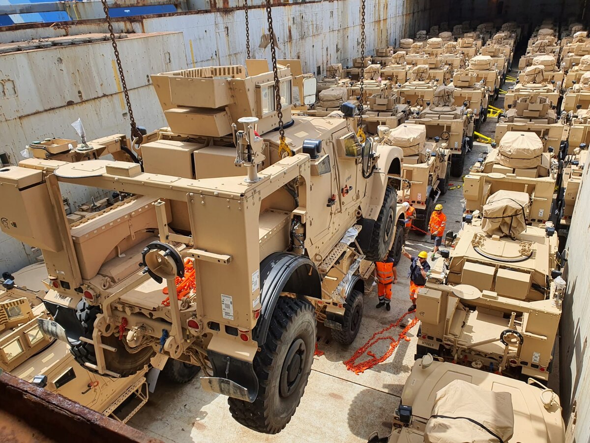 A Mine Resistant Ambush Protected All Terrain Vehicles, or M-ATV, is lowered into the hull of the Ocean Giant cargo vessel at the Port of Livorno in Italy. The 405th Army Field Support Brigade’s Army Field Support Battalion-Africa was responsible for prepping, preparing and moving over 1,300 M-ATVs from its Army Prepositioned Stock-2 site at Leghorn Army Depot to be shipped to other locations for other missions. (U.S. Army photo courtesy of the 839th Transportation Battalion)