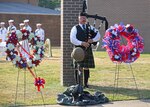 Tom Metz, a bagpiper and retired Lt. Col. from the United States Army, performs Amazing Grace during the annual Norfolk Naval Shipyard Memorial Day Fall-In for Colors May 26.